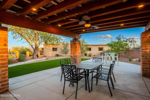 17300 S Camino Cartagena, Sahuarita, AZ 85629 - view of patio with a fenced backyard, a ceiling fan, and outdoor dining space