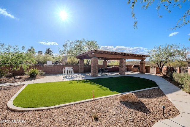 17300 S Camino Cartagena, Sahuarita, AZ 85629 - surrounding community featuring a lawn, a patio, a gazebo, and a fenced backyard