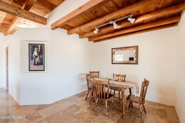 17300 S Camino Cartagena, Sahuarita, AZ 85629 - dining space with wood ceiling, beamed ceiling, and rail lighting