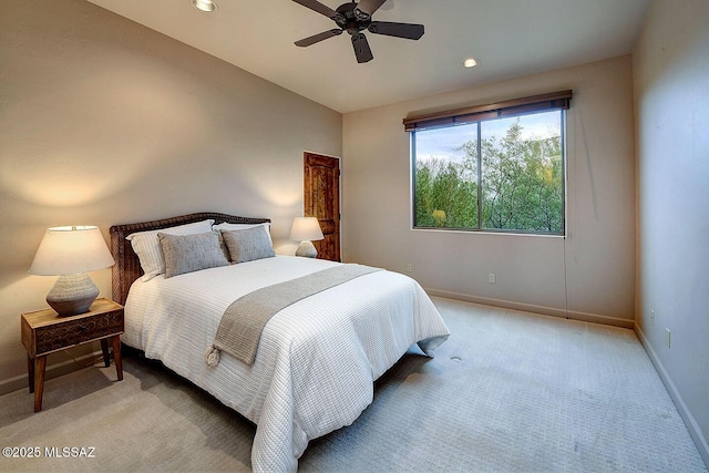 bedroom with recessed lighting, a ceiling fan, baseboards, and light colored carpet