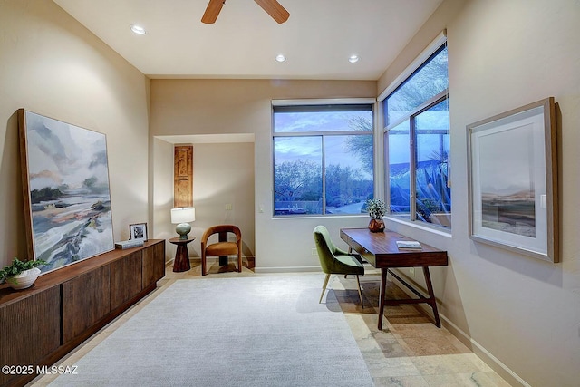 office area with recessed lighting, a ceiling fan, and baseboards