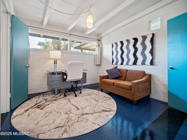 office area featuring beamed ceiling