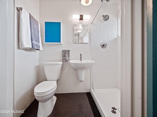 full bath featuring toilet and walk in shower