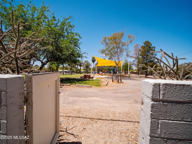 view of property's community featuring a playground
