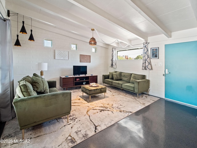 living area with beam ceiling