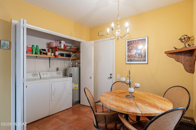 dining area featuring water heater, independent washer and dryer, a notable chandelier, and light tile patterned floors