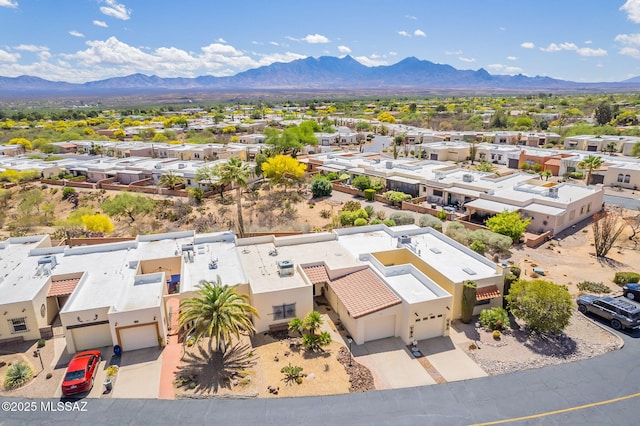 aerial view with a mountain view and a residential view