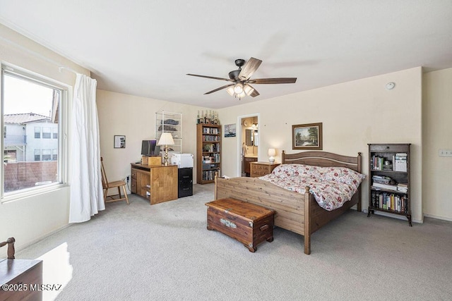 3969 W Pine Creek Way, Tucson, AZ 85745 - bedroom featuring light colored carpet, ensuite bath, and a ceiling fan