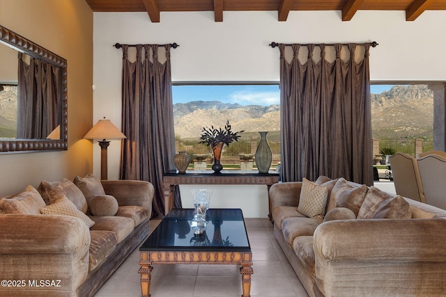 11028 N Pusch Ridge View Pl, Oro Valley, AZ 85737 - tiled living room featuring a mountain view and wooden ceiling with exposed beams