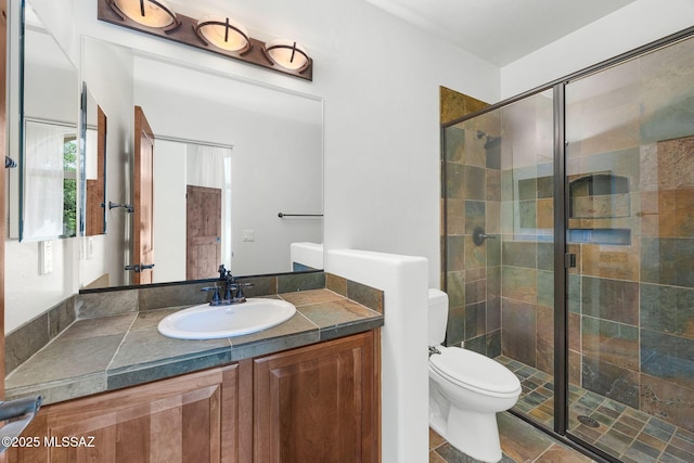 11028 N Pusch Ridge View Pl, Oro Valley, AZ 85737 - bathroom featuring toilet, vanity, and a shower stall