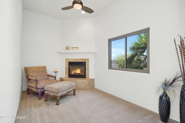 11028 N Pusch Ridge View Pl, Oro Valley, AZ 85737 - living area featuring carpet floors, a tile fireplace, ceiling fan, and recessed lighting