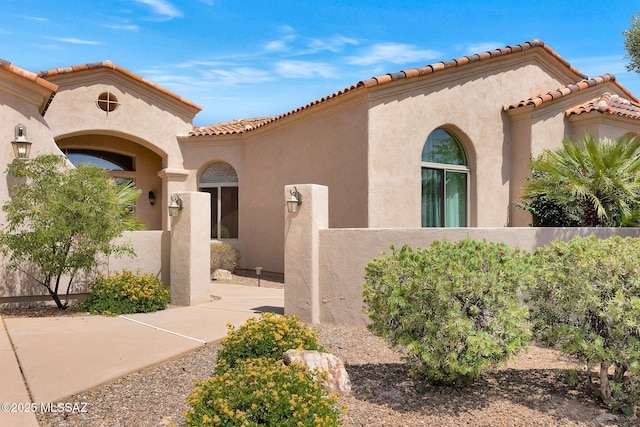 11028 N Pusch Ridge View Pl, Oro Valley, AZ 85737 - mediterranean / spanish-style home with stucco siding and a tile roof