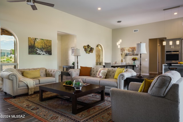 living area featuring visible vents, recessed lighting, dark wood-style flooring, and ceiling fan