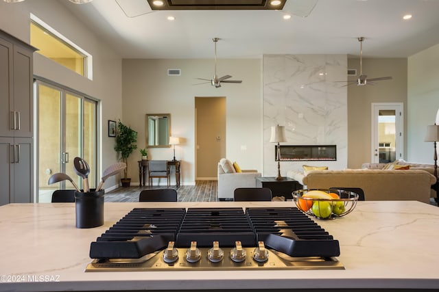 kitchen with ceiling fan, recessed lighting, and visible vents