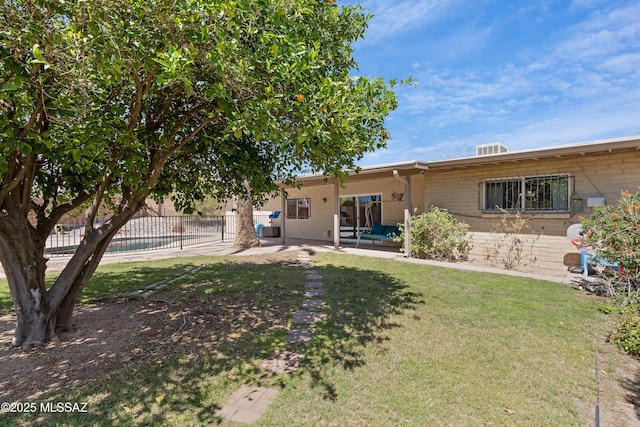 rear view of house with a patio