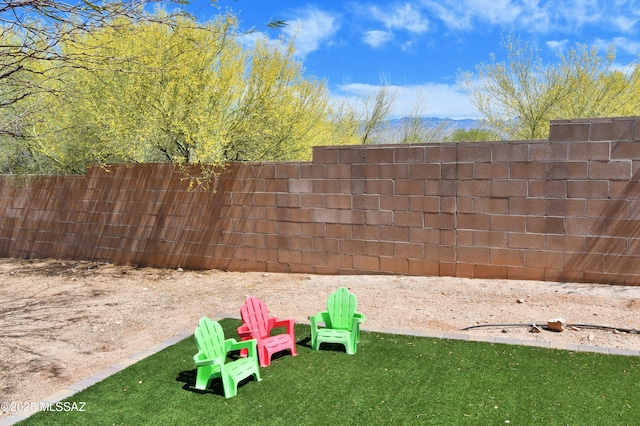 view of yard featuring fence