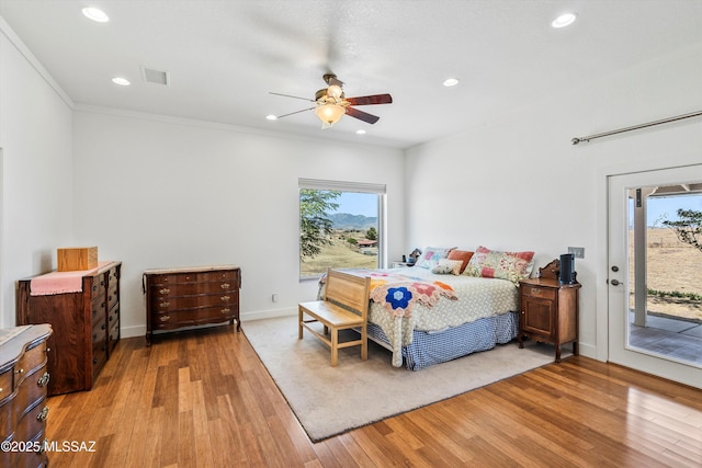 20 Buckskin Ln, Sonoita, AZ 85637 - bedroom with visible vents, recessed lighting, wood finished floors, and access to exterior