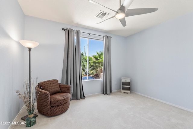 7541 W Wandering Coyote Dr, Tucson, AZ 85743 - sitting room with ceiling fan, carpet floors, and baseboards