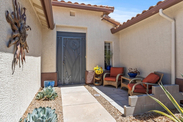 7541 W Wandering Coyote Dr, Tucson, AZ 85743 - entrance to property featuring stucco siding and a tile roof