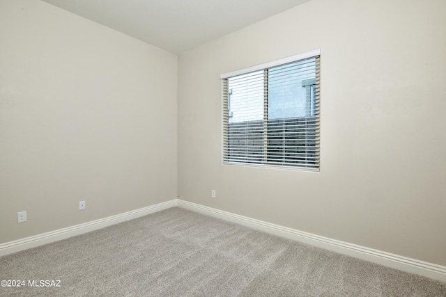 13711 N Hidden Springs Dr, Oro Valley, AZ 85755 - carpeted empty room with baseboards