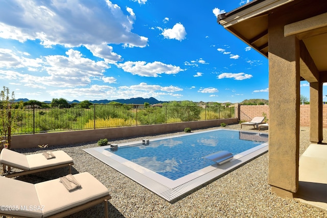 13711 N Hidden Springs Dr, Oro Valley, AZ 85755 - view of pool with a mountain view, a fenced backyard, and a patio