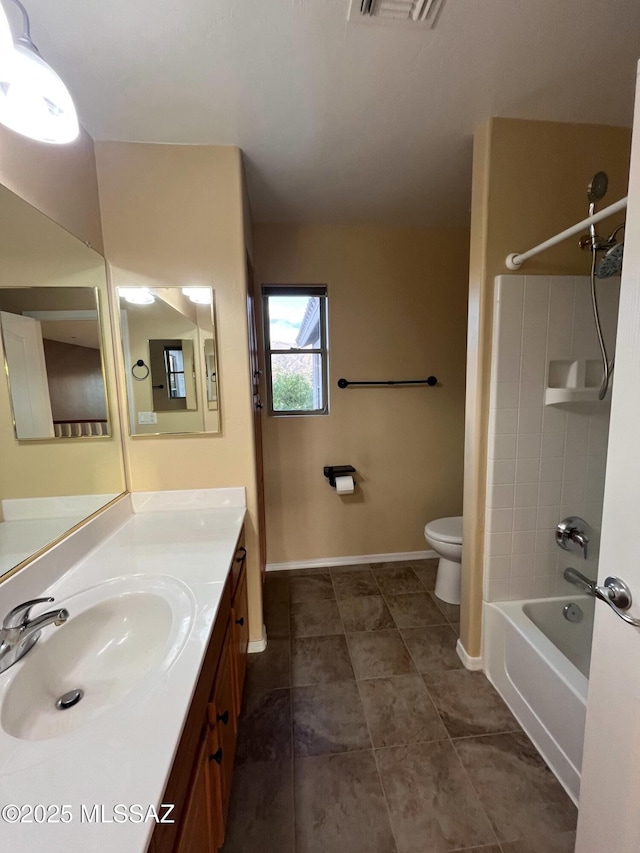 60954 Rock Ledge Loop, Tucson, AZ 85739 - full bath with toilet, vanity, shower / bath combination, baseboards, and tile patterned flooring