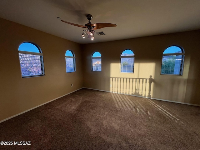 60954 Rock Ledge Loop, Tucson, AZ 85739 - carpeted spare room featuring ceiling fan, healthy amount of natural light, and baseboards