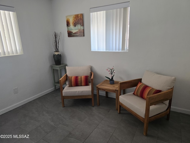 4825 E Hawthorne St, Tucson, AZ 85711 - living area featuring baseboards