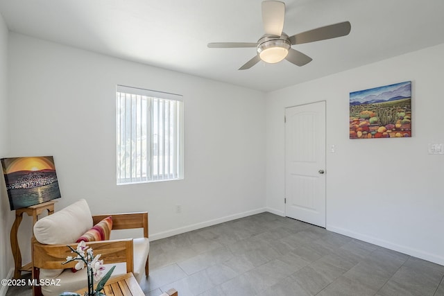 4825 E Hawthorne St, Tucson, AZ 85711 - sitting room with ceiling fan and baseboards