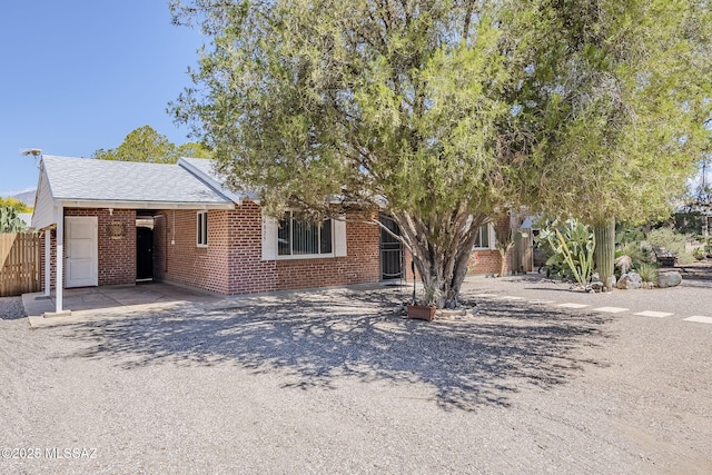 4825 E Hawthorne St, Tucson, AZ 85711 - view of front of house featuring brick siding