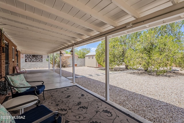 4825 E Hawthorne St, Tucson, AZ 85711 - view of patio with a storage unit