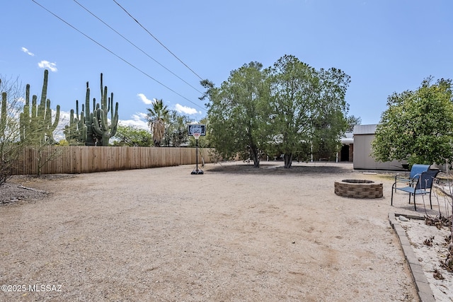 4825 E Hawthorne St, Tucson, AZ 85711 - view of yard with a fire pit