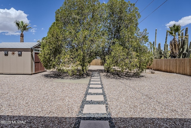 4825 E Hawthorne St, Tucson, AZ 85711 - view of yard featuring a storage shed