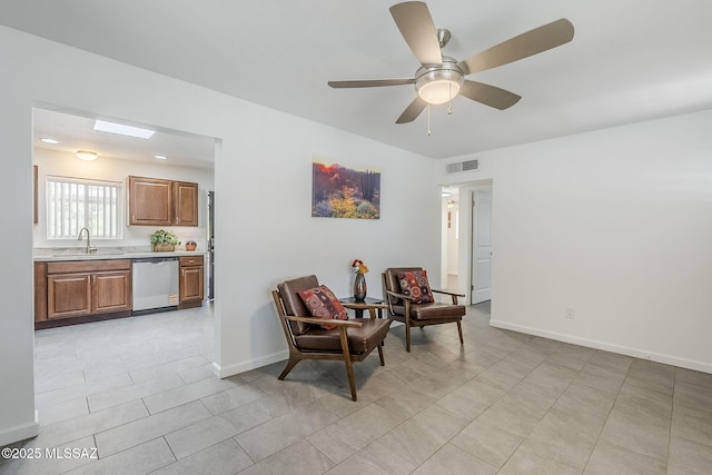 4825 E Hawthorne St, Tucson, AZ 85711 - living area with a ceiling fan and light tile patterned flooring