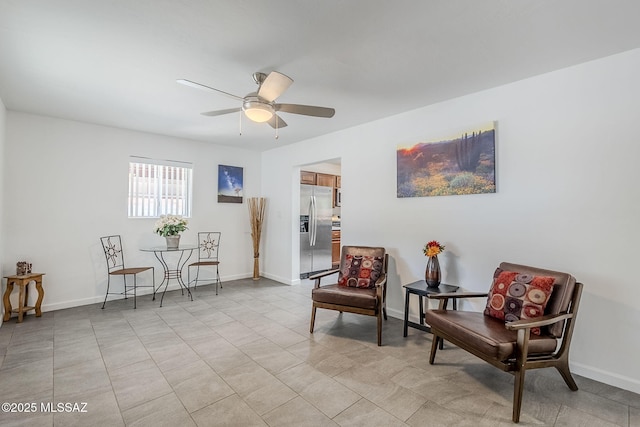 4825 E Hawthorne St, Tucson, AZ 85711 - living area with ceiling fan and baseboards