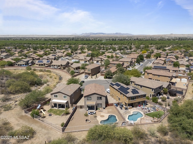 birds eye view of property with a residential view and a mountain view