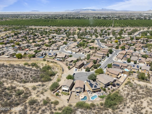 aerial view with a rural view, a residential view, and a mountain view