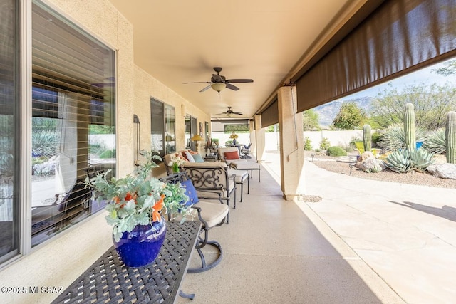 61867 E Ironwood Ln, Tucson, AZ 85739 - view of patio / terrace featuring fence, a ceiling fan, and outdoor dining area