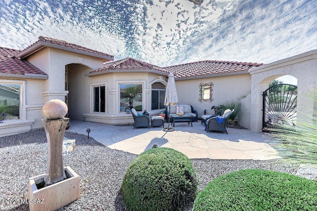 61867 E Ironwood Ln, Tucson, AZ 85739 - view of patio featuring outdoor lounge area