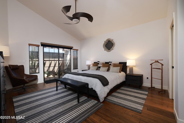 bedroom featuring access to outside, baseboards, wood finished floors, and high vaulted ceiling