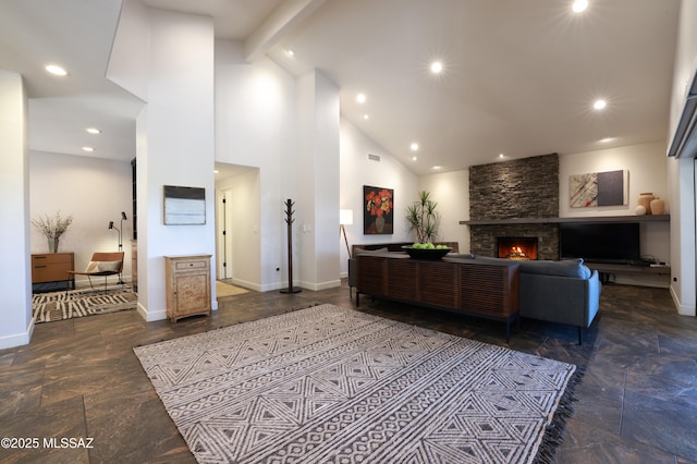living room with high vaulted ceiling, a stone fireplace, stone tile flooring, baseboards, and recessed lighting