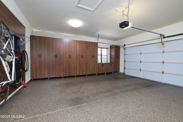 garage featuring a garage door opener