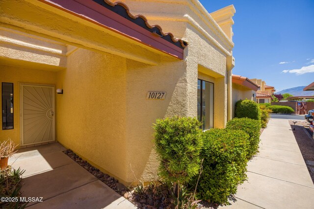 10127 E Achi, Tucson, AZ 85748 - view of side of property with stucco siding
