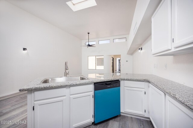 10127 E Achi, Tucson, AZ 85748 - kitchen with dishwasher, a sink, dark wood finished floors, ceiling fan, and white cabinetry