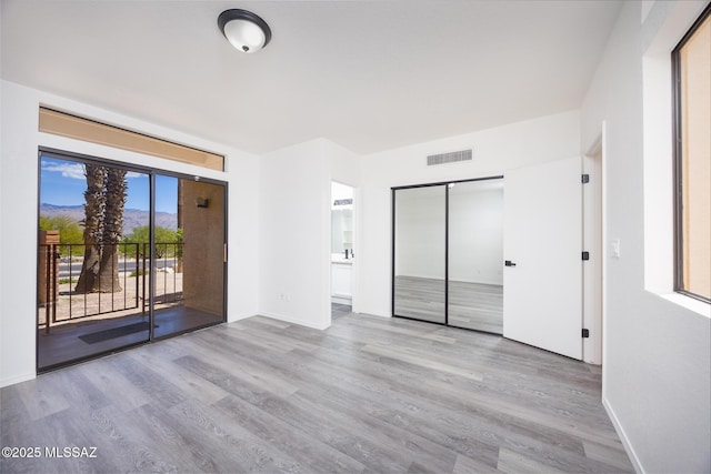 10127 E Achi, Tucson, AZ 85748 - unfurnished room with wood finished floors and baseboards
