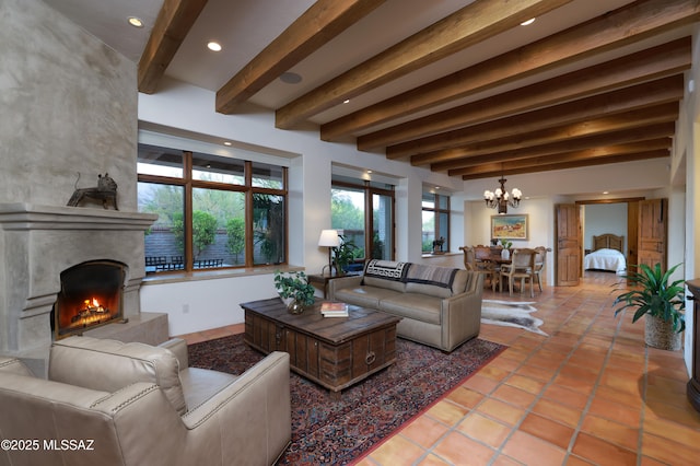 4915 N Via De La Granja, Tucson, AZ 85718 - living area with a chandelier, beamed ceiling, a large fireplace, tile patterned floors, and recessed lighting