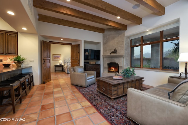 4915 N Via De La Granja, Tucson, AZ 85718 - living area with beamed ceiling, a fireplace, and recessed lighting