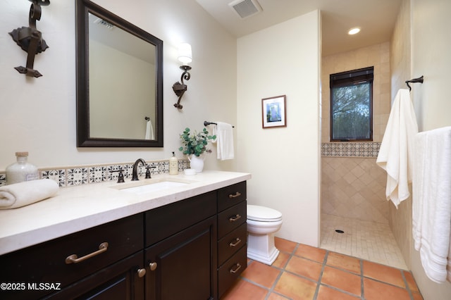 4915 N Via De La Granja, Tucson, AZ 85718 - bathroom featuring vanity, walk in shower, toilet, tile patterned flooring, and recessed lighting