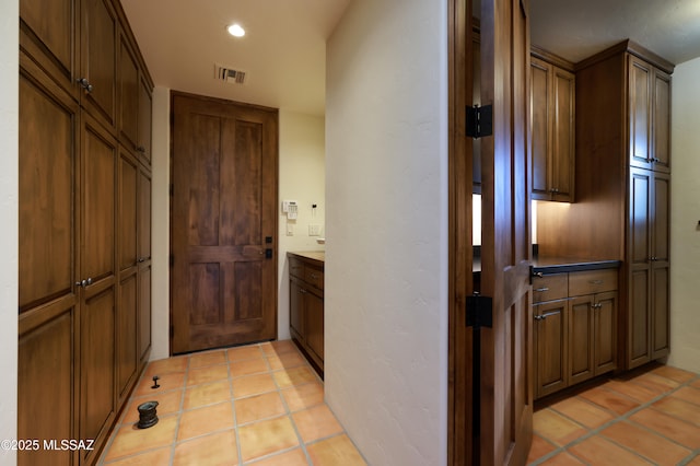4915 N Via De La Granja, Tucson, AZ 85718 - hallway featuring recessed lighting and light tile patterned floors