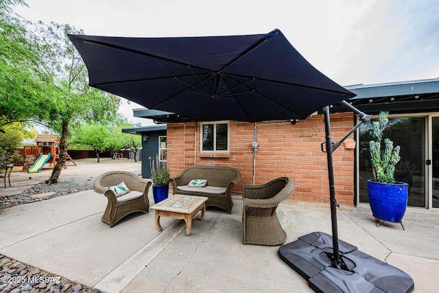 1652 W Roller Coaster Rd, Tucson, AZ 85704 - view of patio with outdoor lounge area, a playground, and fence